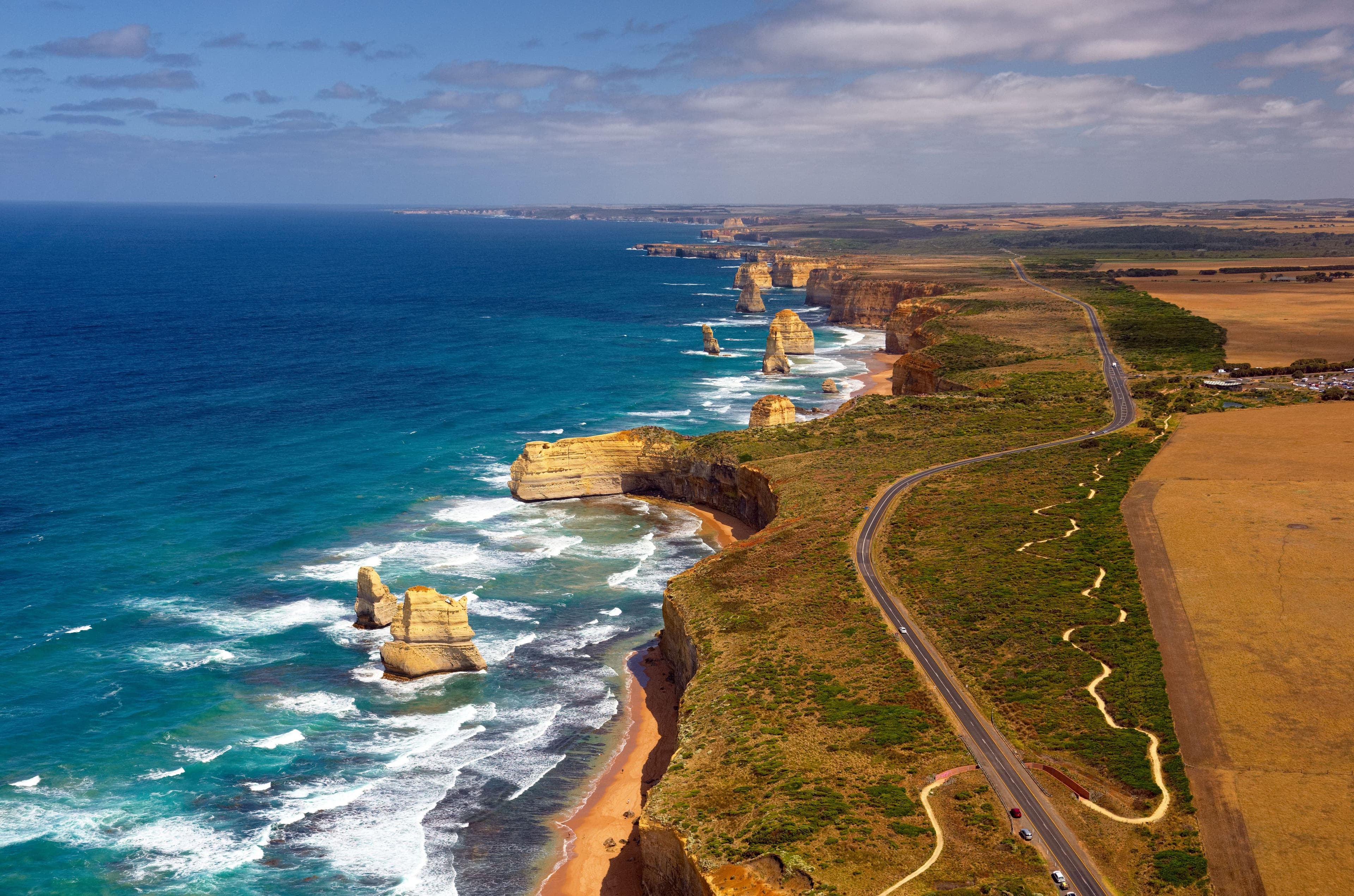 The winding Great Ocean Road passes the iconic Twelve Apostles